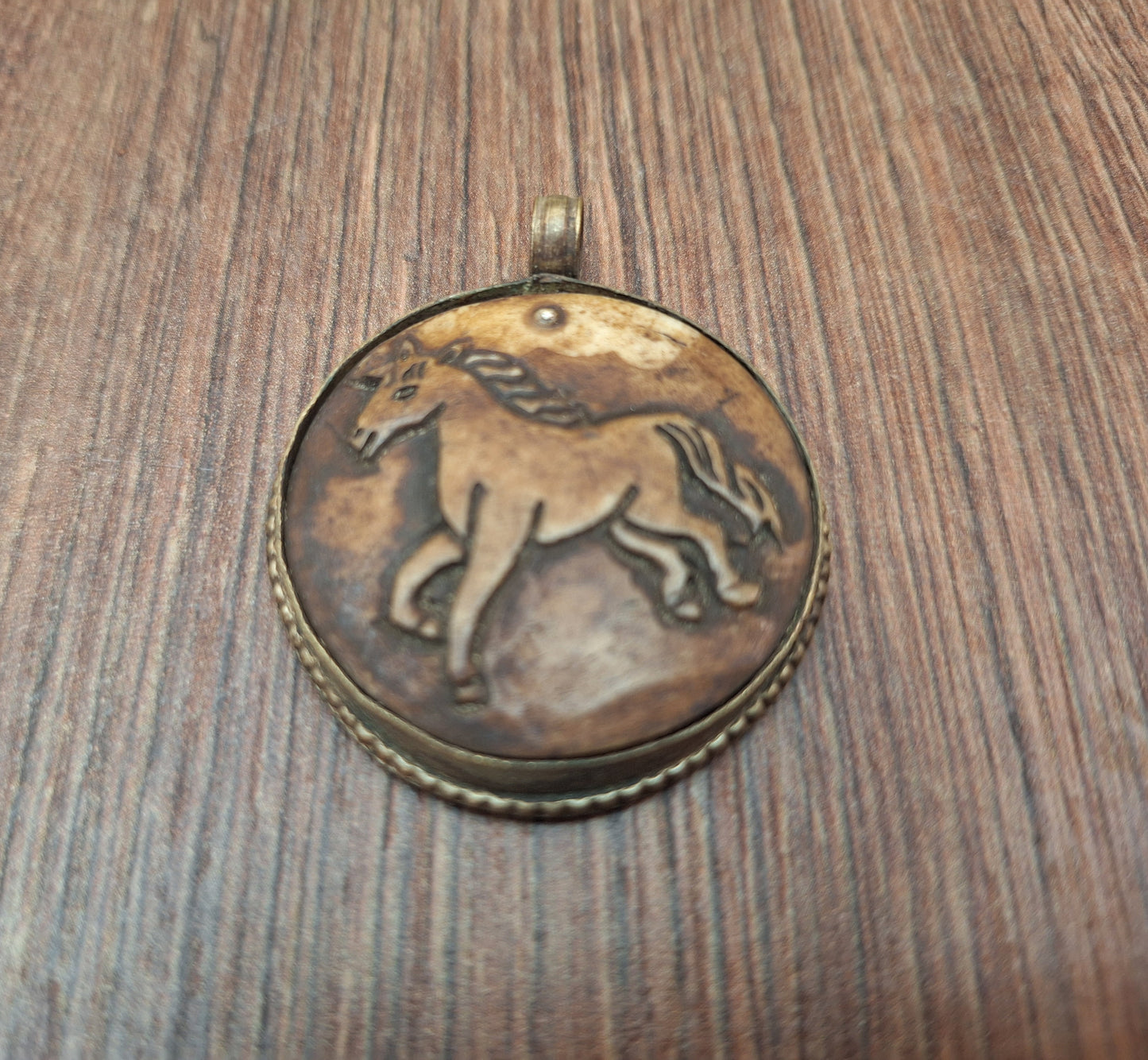 Vintage yak bone pendant Horse