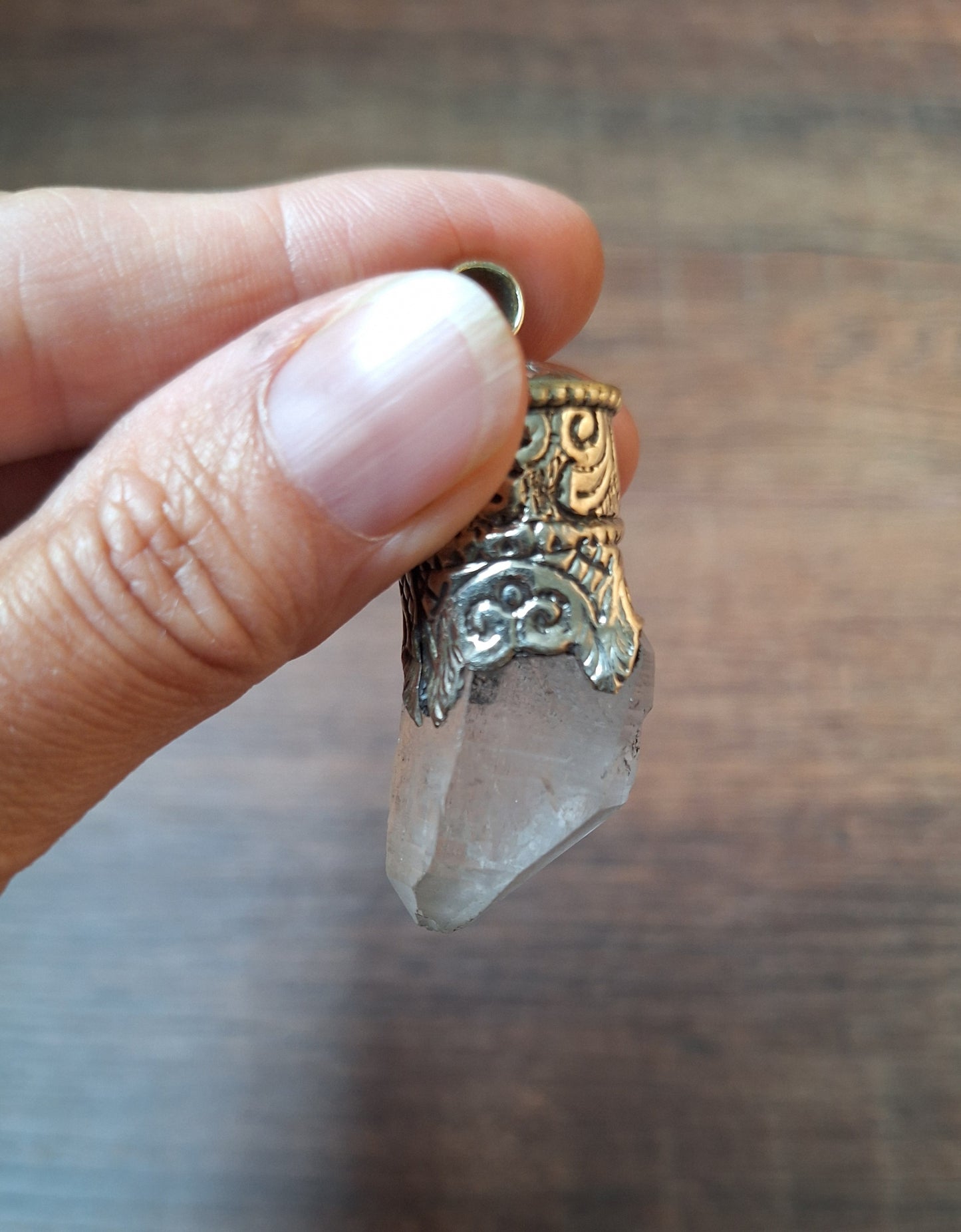Vintage quartz crystal in Tibetan silver pendant