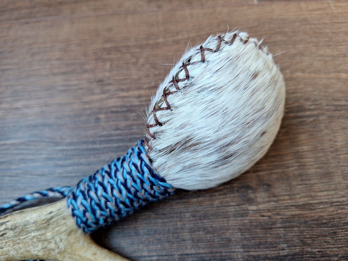 Horse hide and roe deer antler rattle