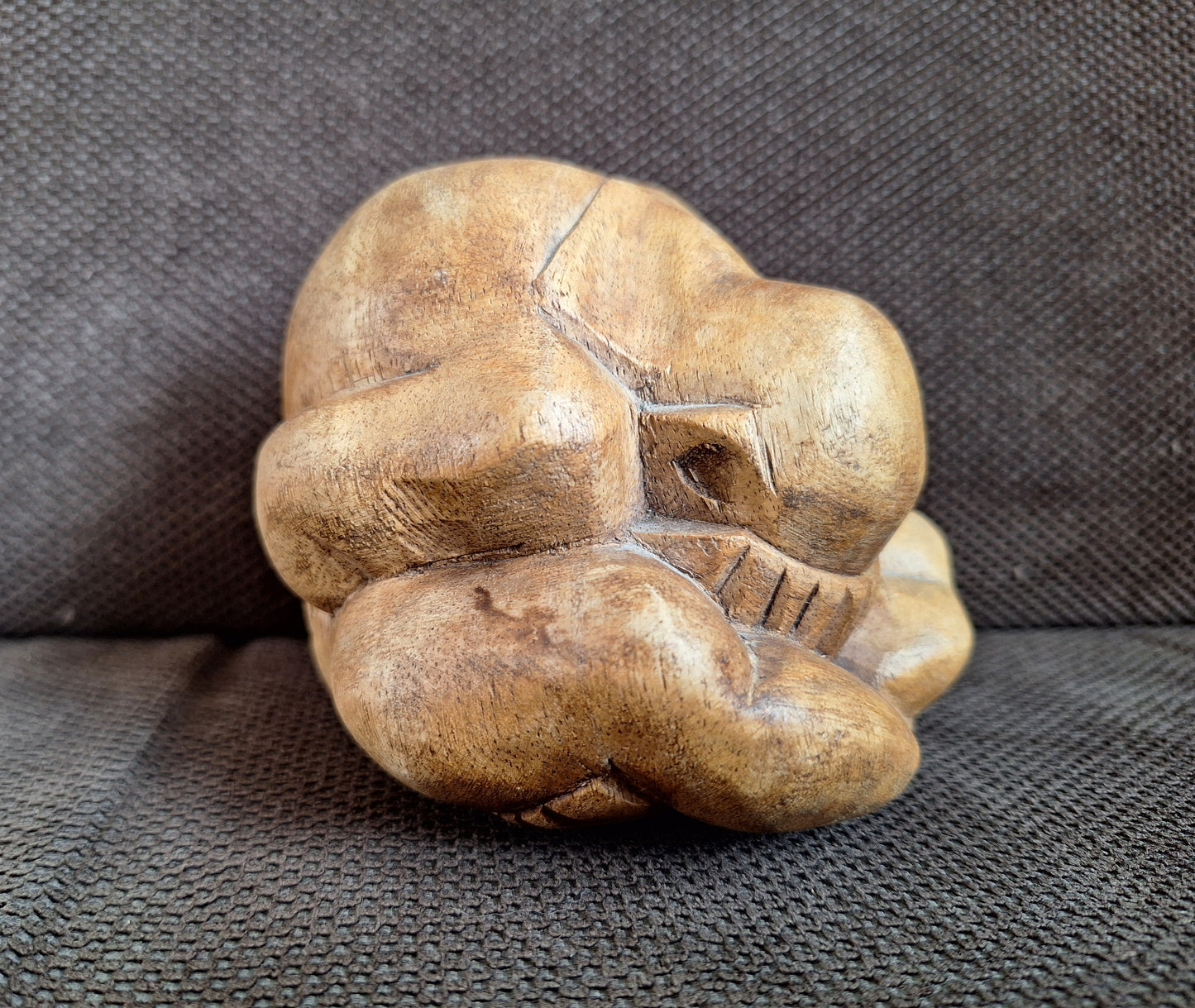 Wooden Weeping Buddha figurine