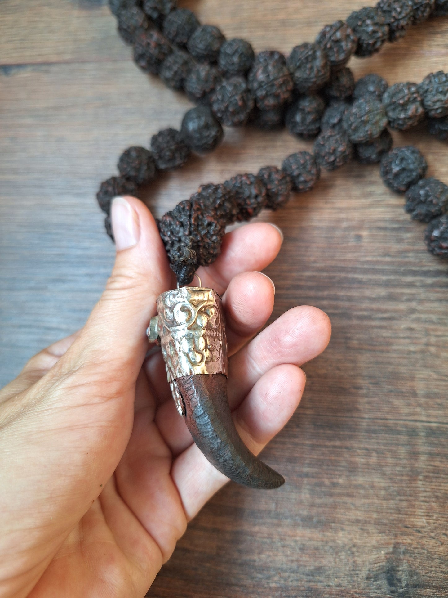 Vintage Nepalese rudraksha mala with horn pendant