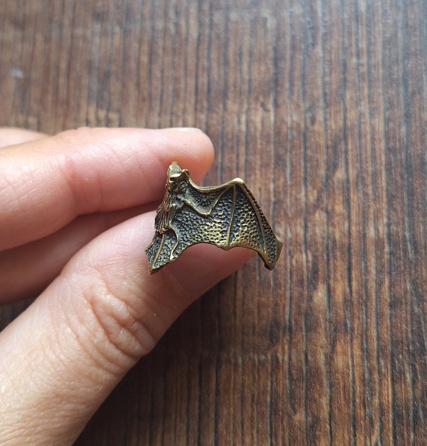 Brass ring Bat