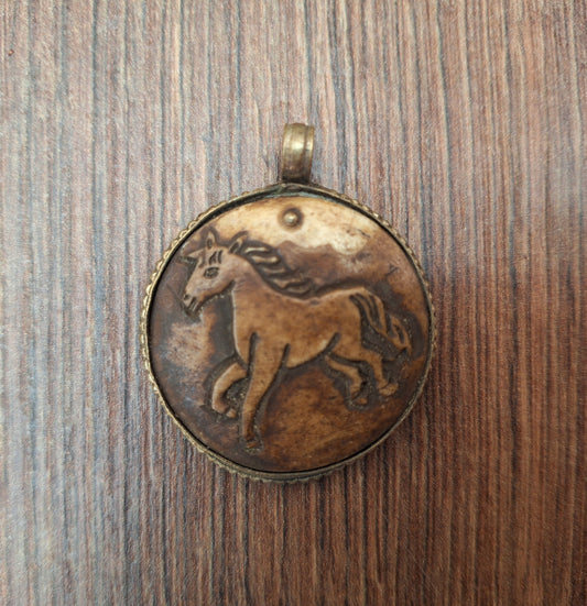 Vintage yak bone pendant Horse