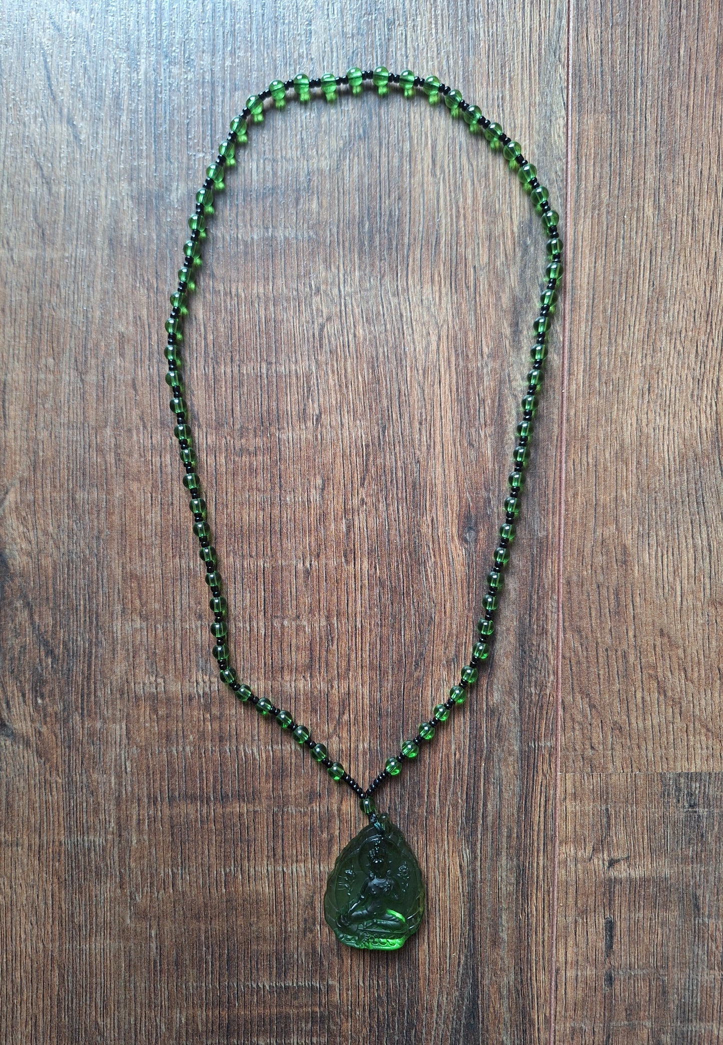 Green glass necklace with Green Tara pendant