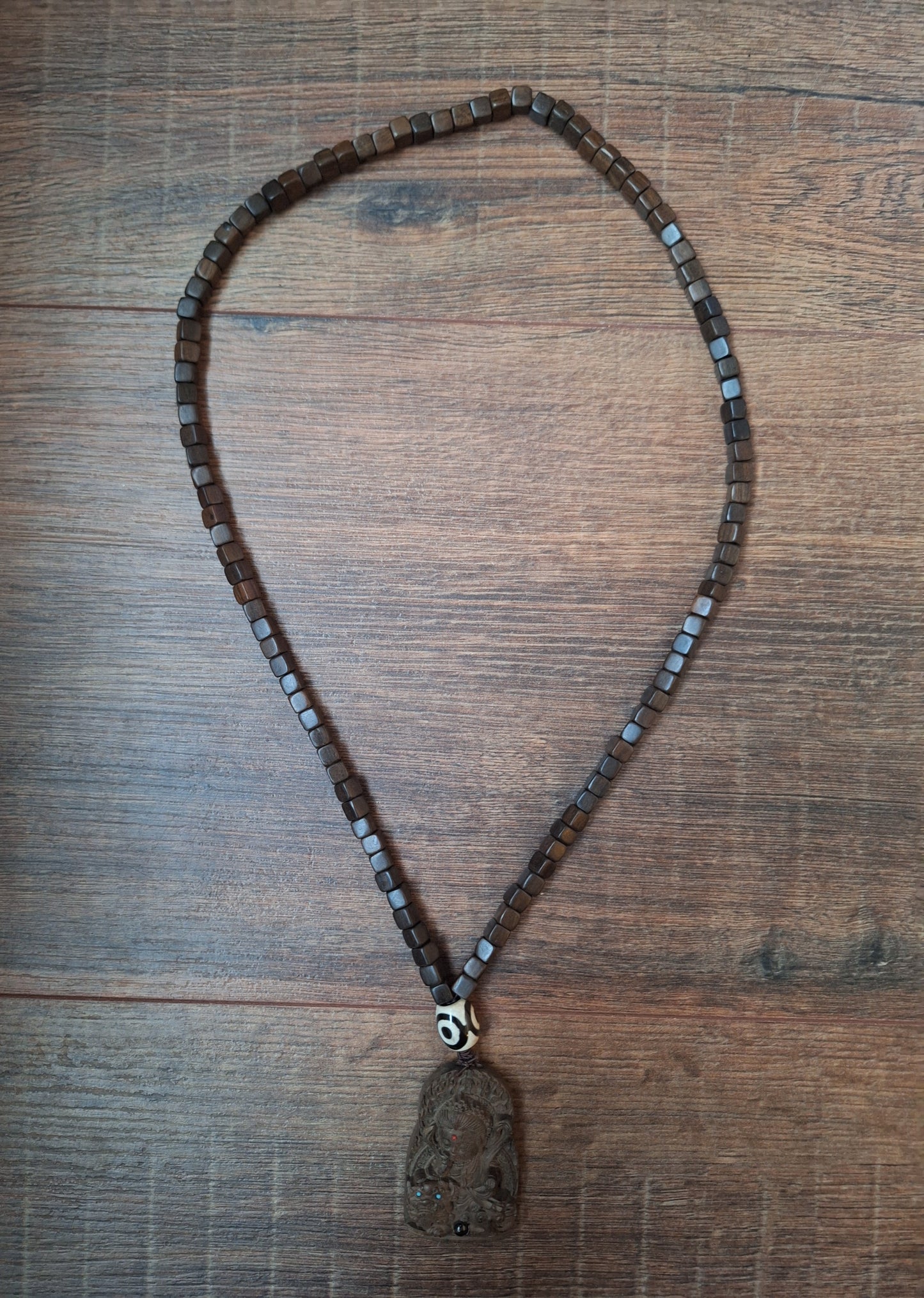 Wooden mala with Guanyin pendant