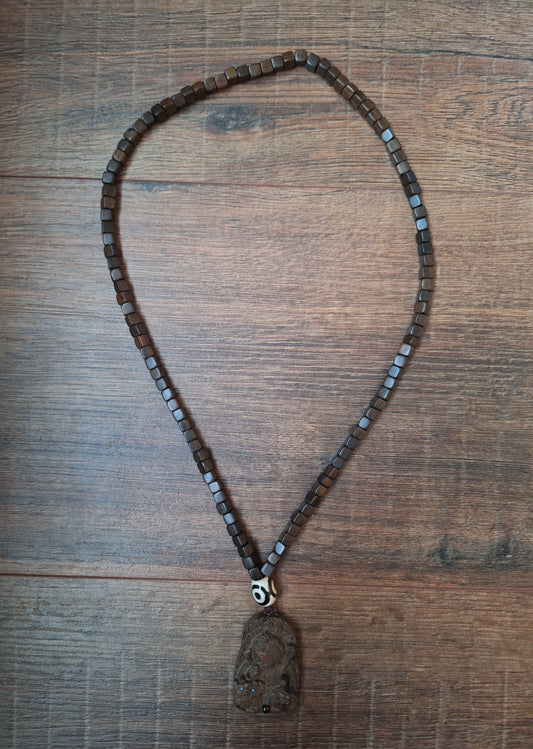 Wooden mala with Guanyin pendant