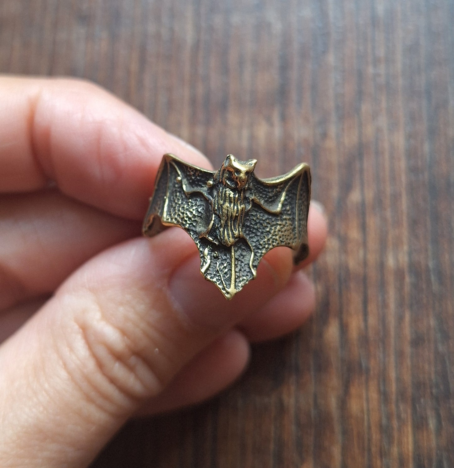 Brass ring Bat