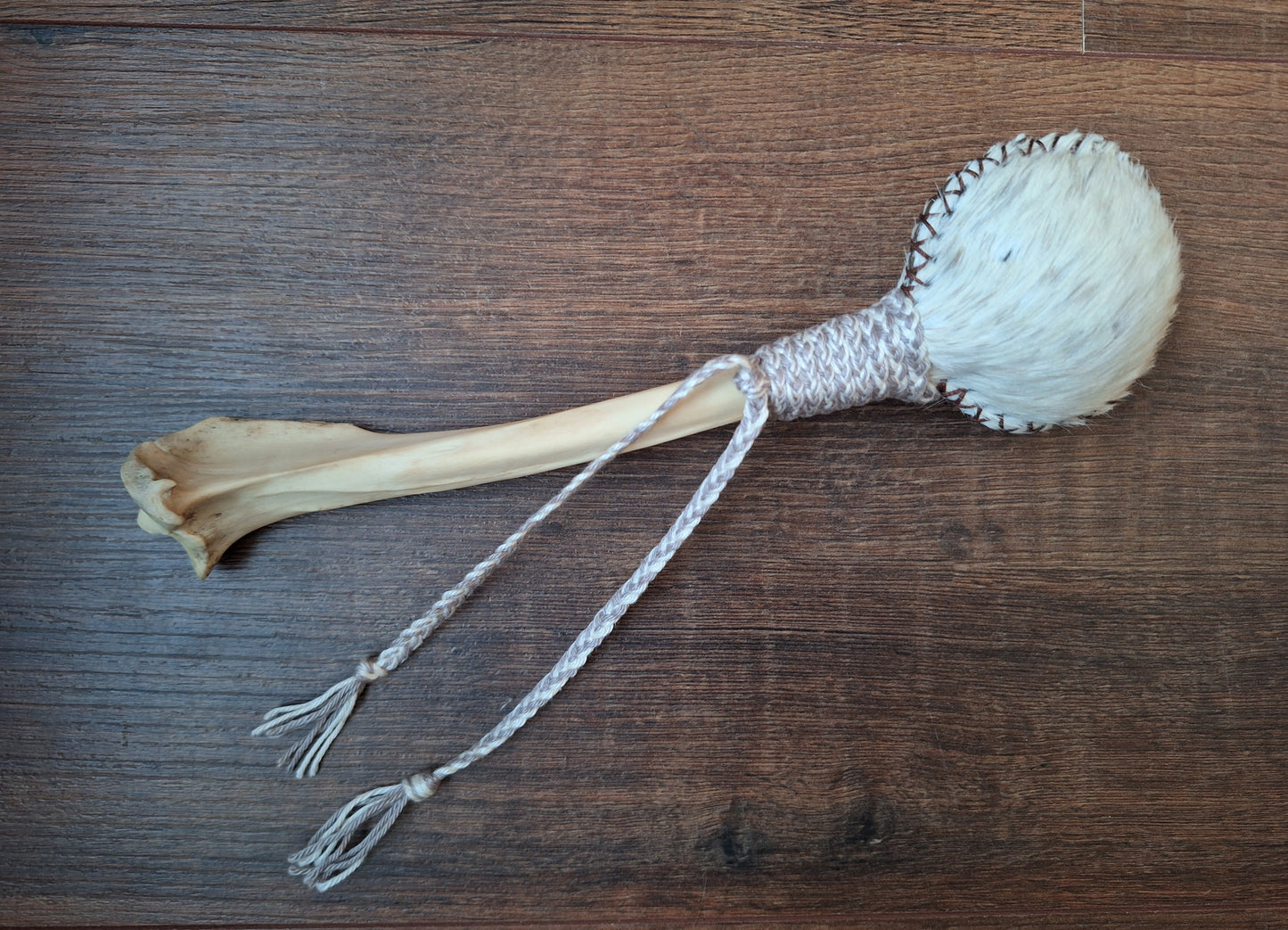Horse hide and red deer leg bone rattle