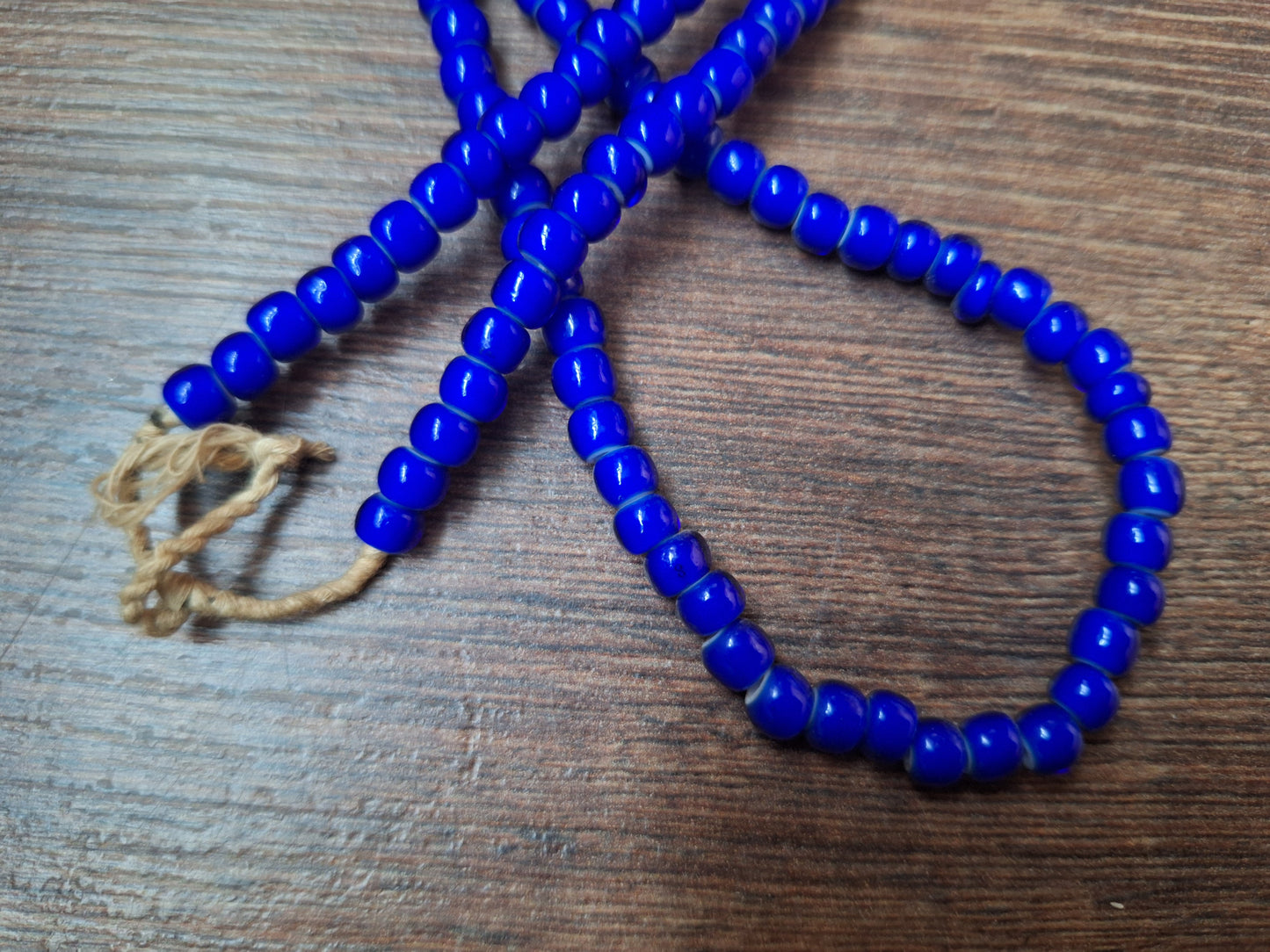 Blue glass bead strand