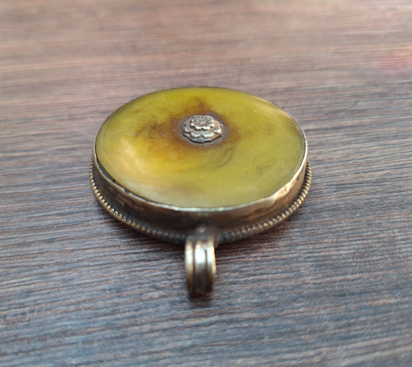Vintage Tibetan silver and copal pendant